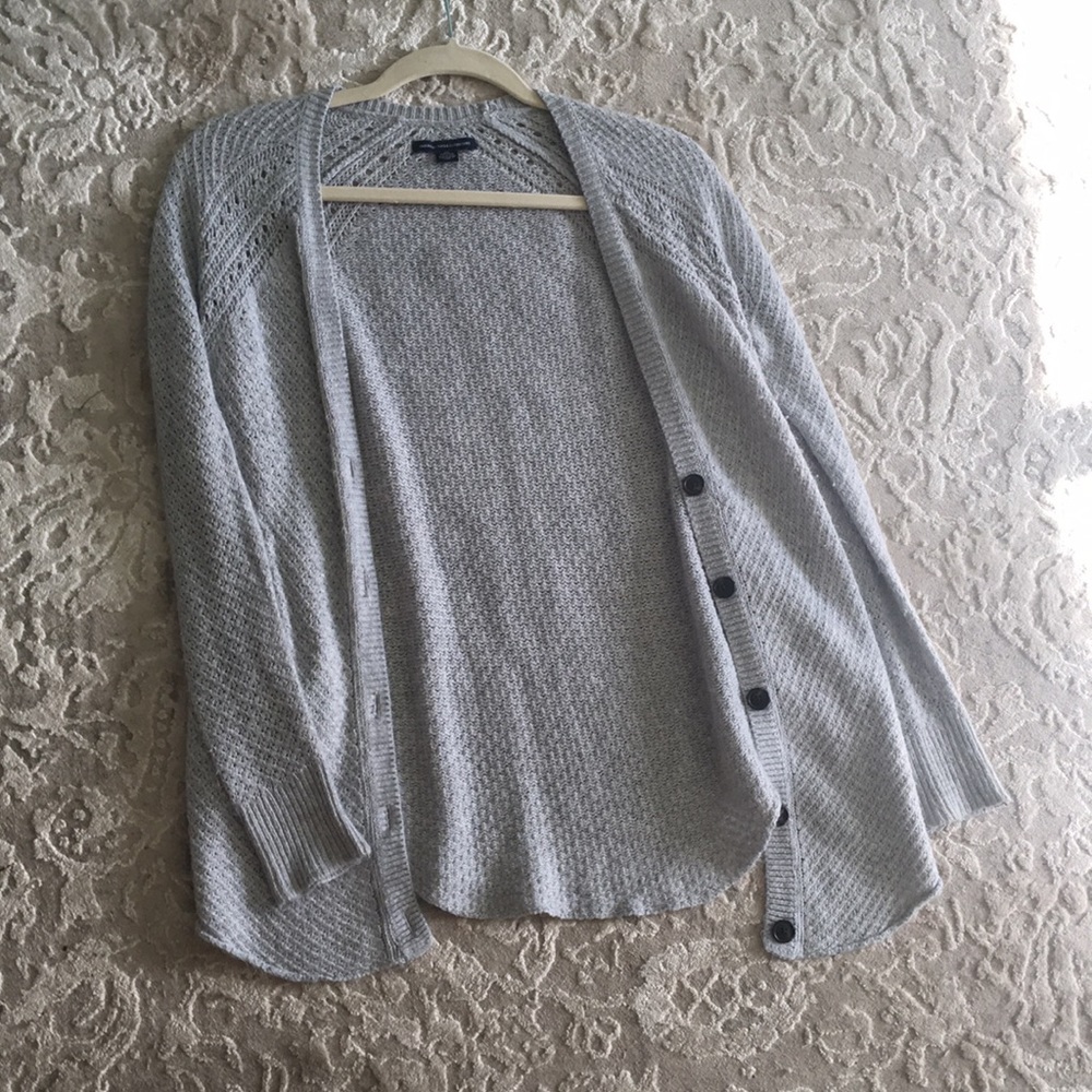 Light grey knitted cardigan with 4 medium buttons